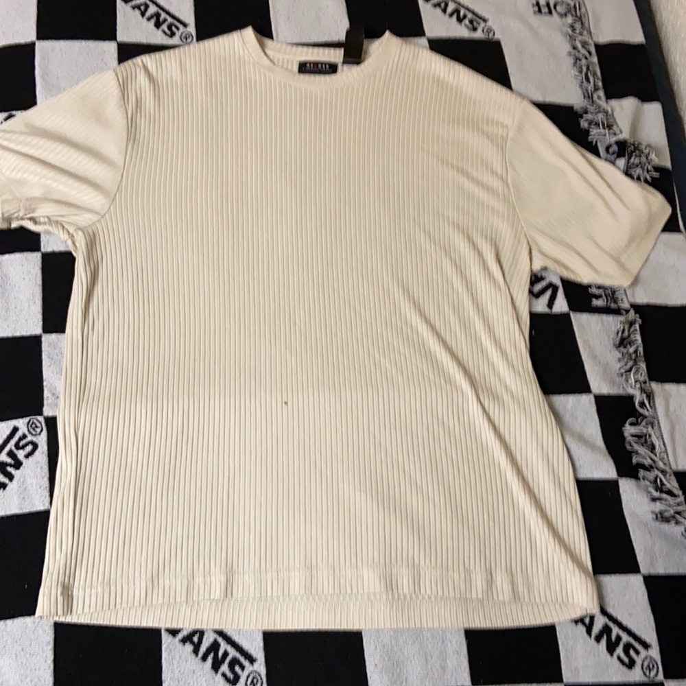 Casual shirt. Textured pattern. Access Company.